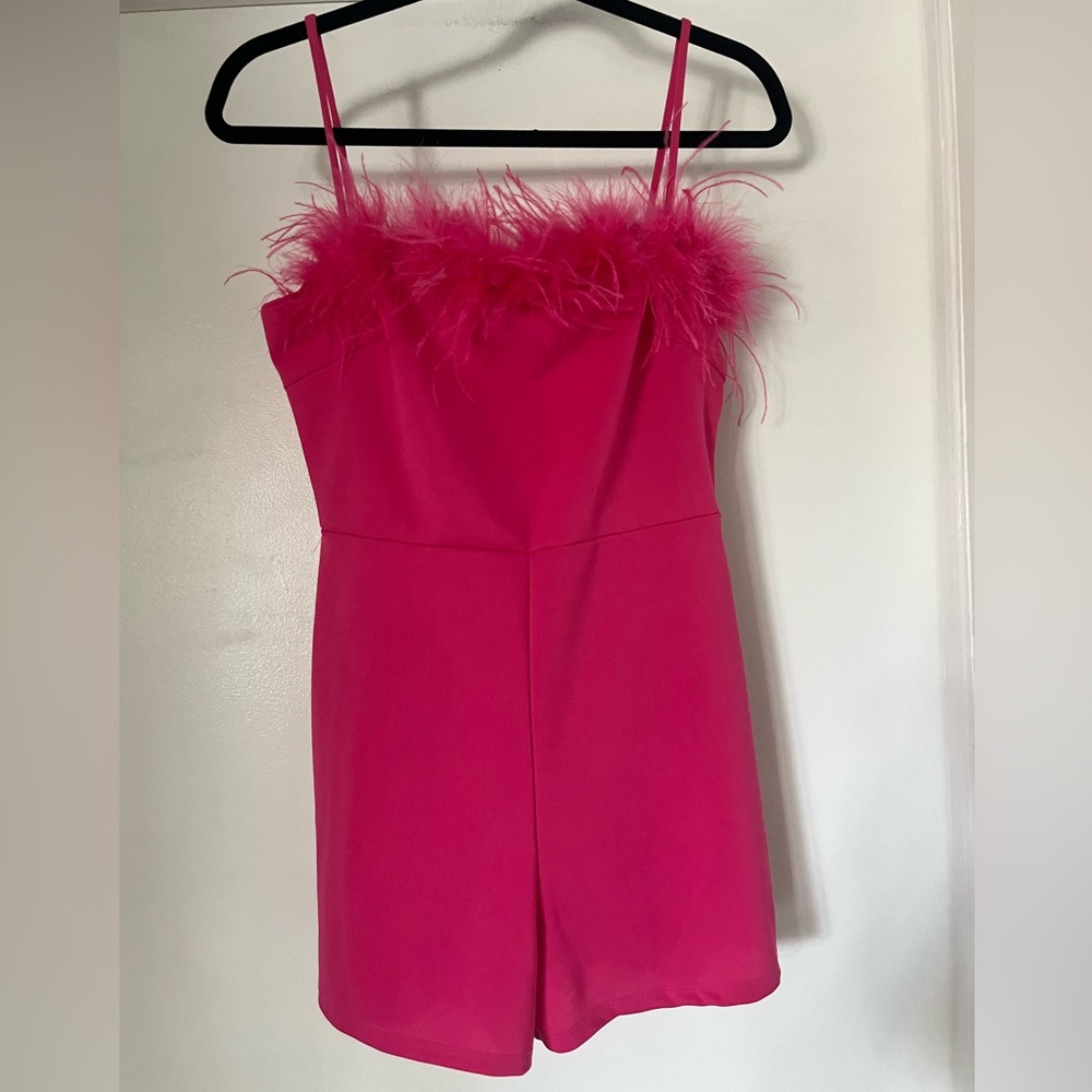 Hot pink feather romper.